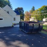 Reeds dumpster in driveway